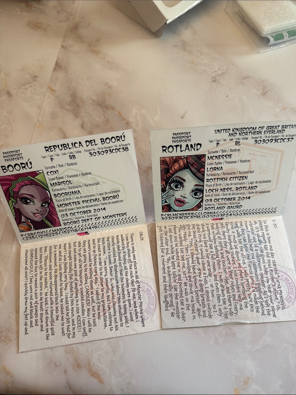 monster high passport playset with pink, purple, green and blue accents